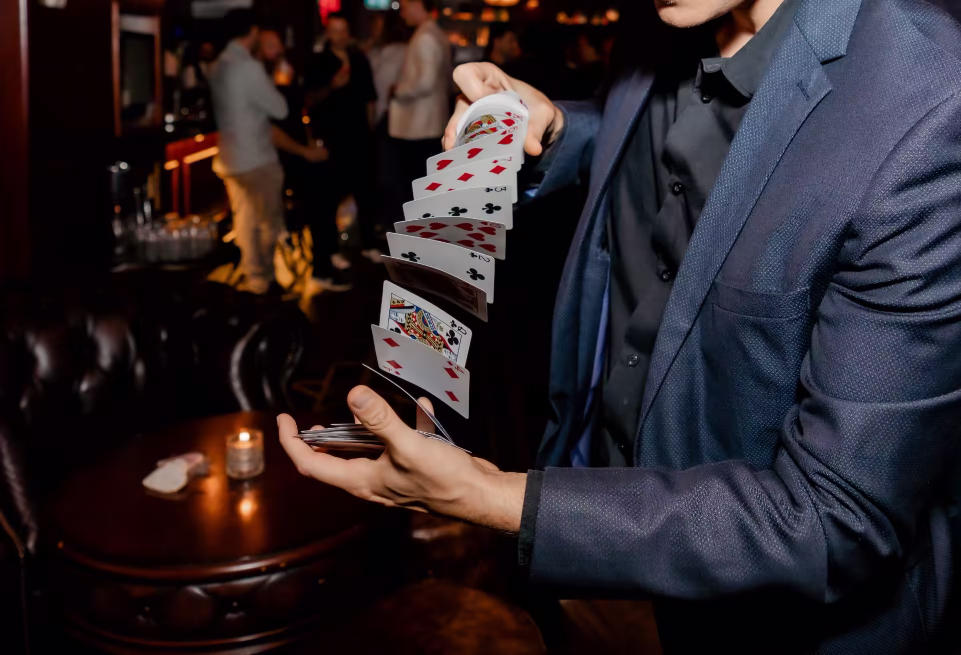 Jason Gray entertaining event guests with close-up magic